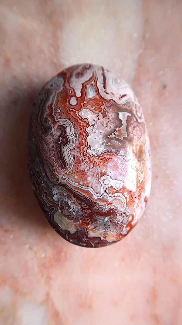 Crazy Lace Agate Palm Stone