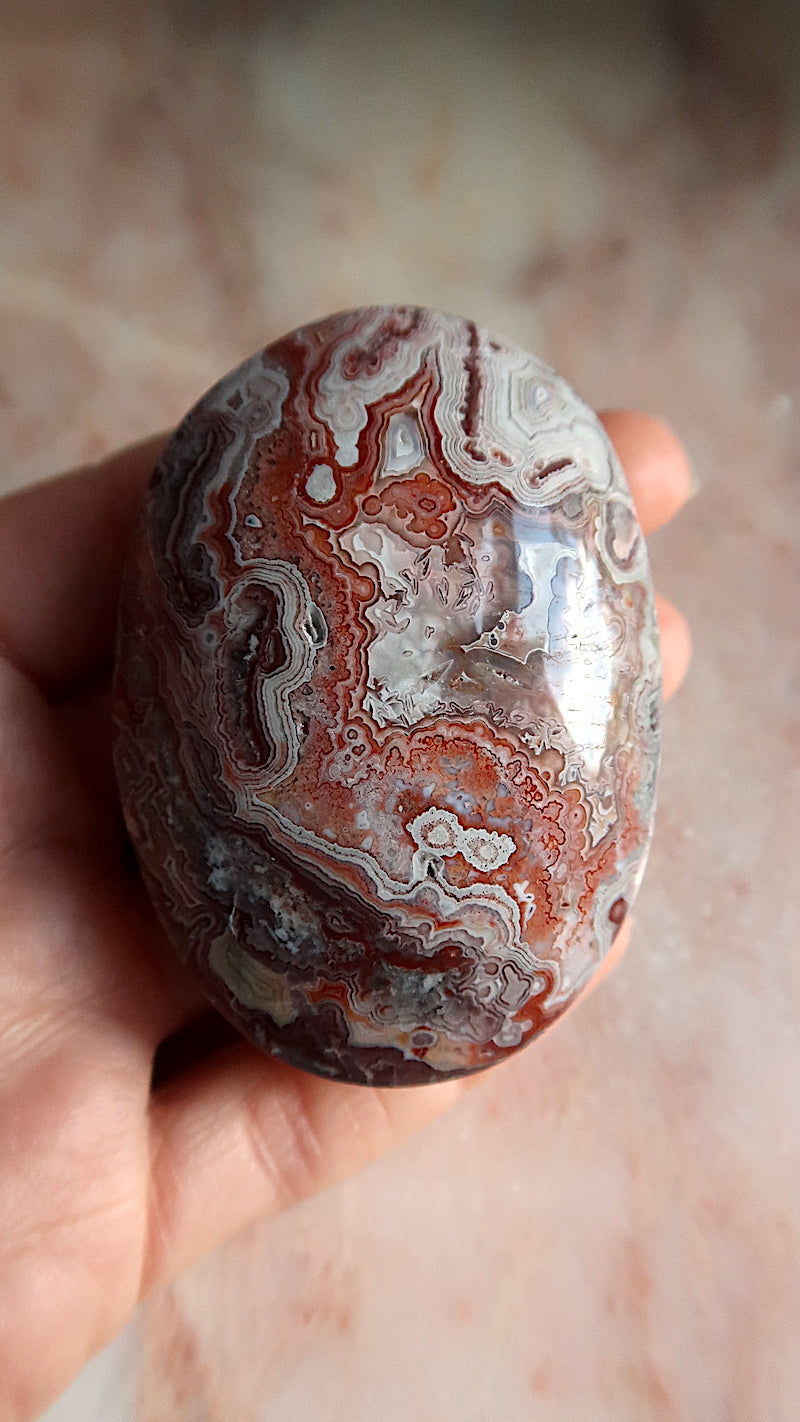 Crazy Lace Agate Palm Stone
