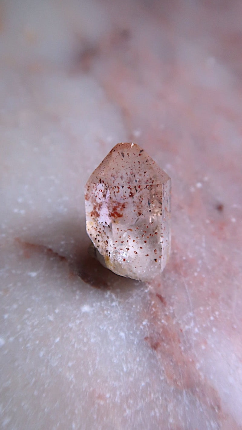 (Harlequin Quartz) Lepidocrosite inclusions in Quartz